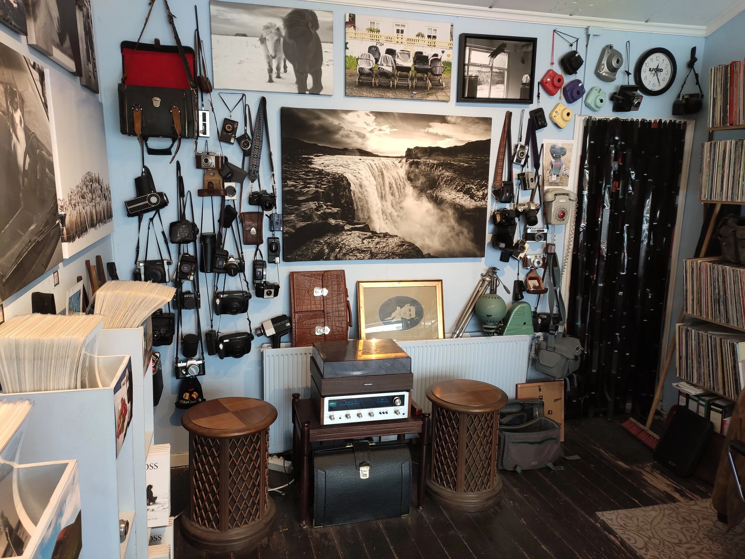 A shiny little red store in Reykjavík Iceland where you find nice photography, while listening to music played from vinyl records.